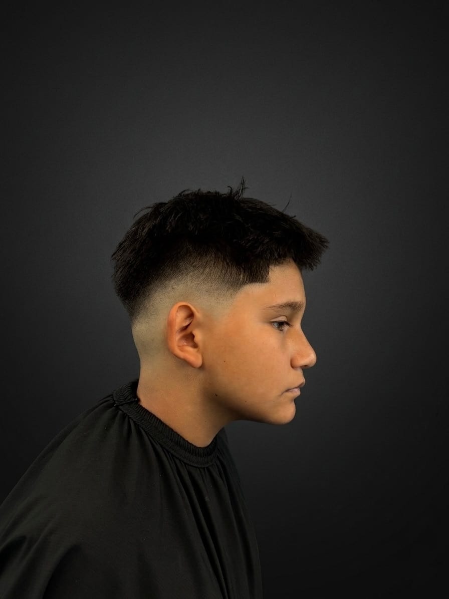 Young gent, mid fade , textured top, Juan Zapata, barber in Davie, FL